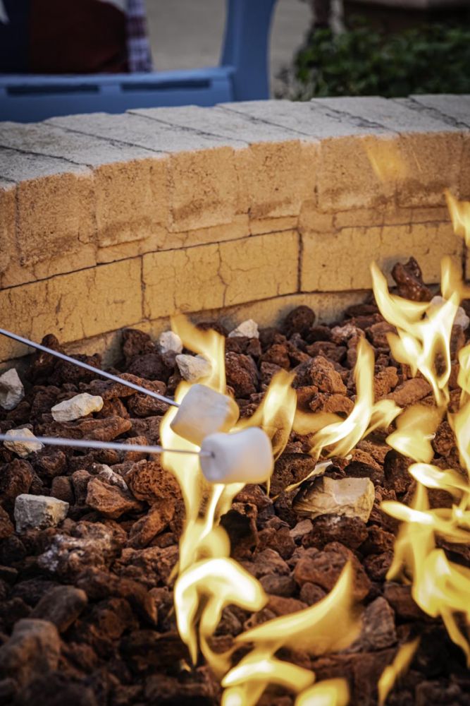 marshmallows roasting on a fire