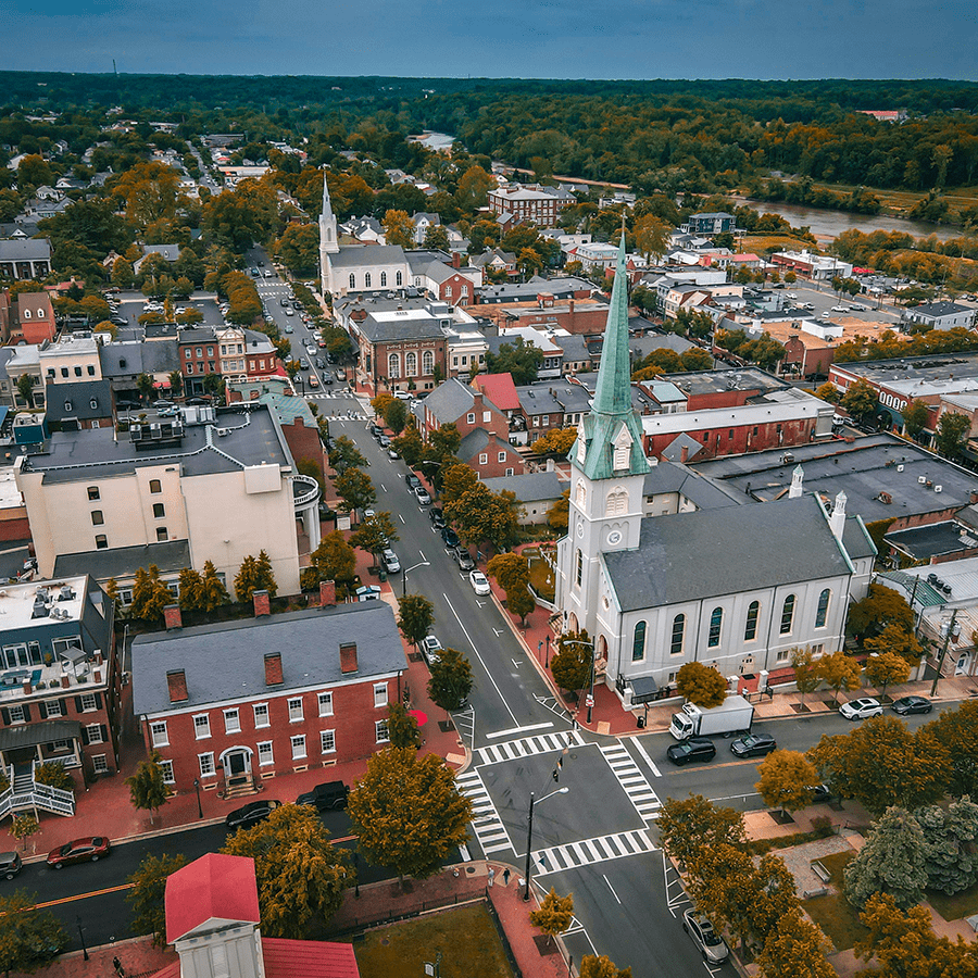 Aerial View around the historic downtown building and charming little shops near Oakwood RV Resort in Fredericksburg, TX.